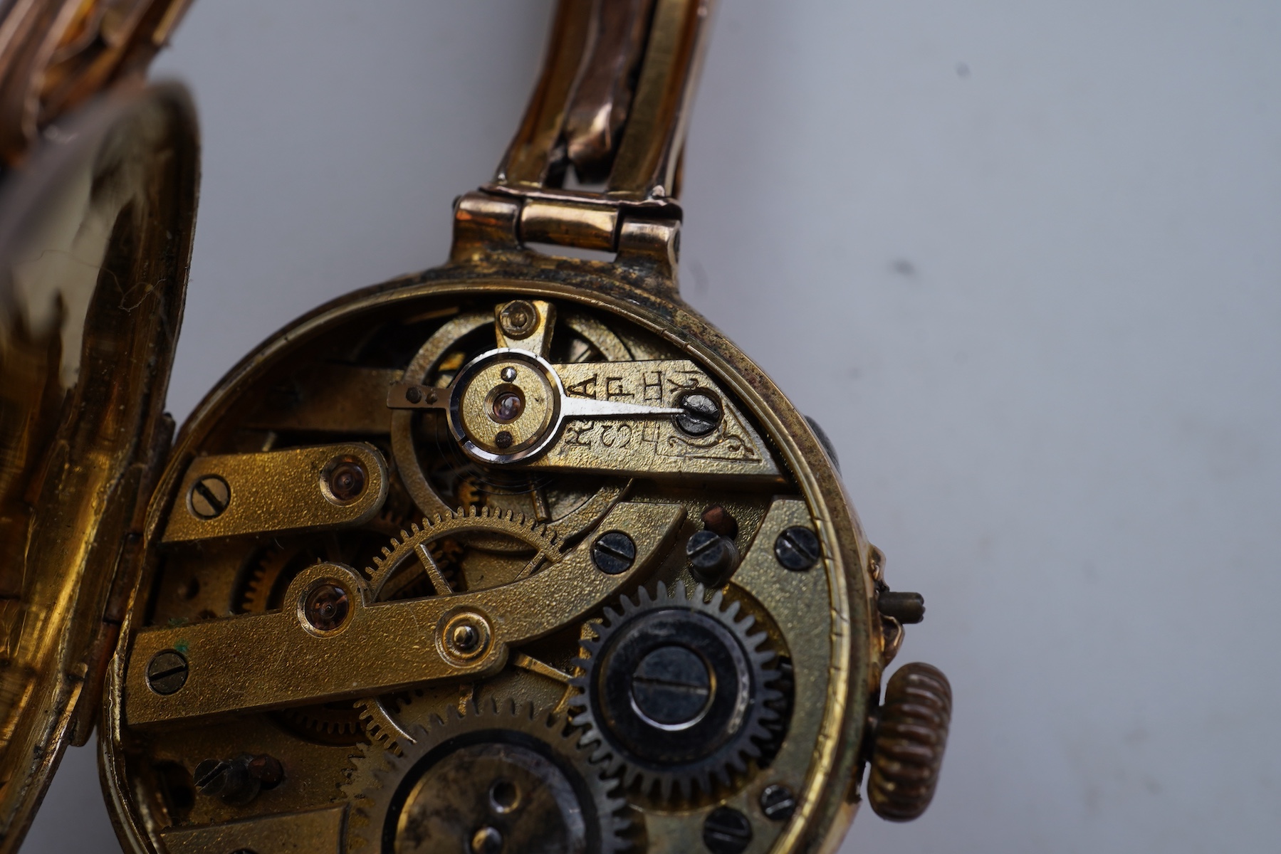 Two gold bracelets and a gold watch